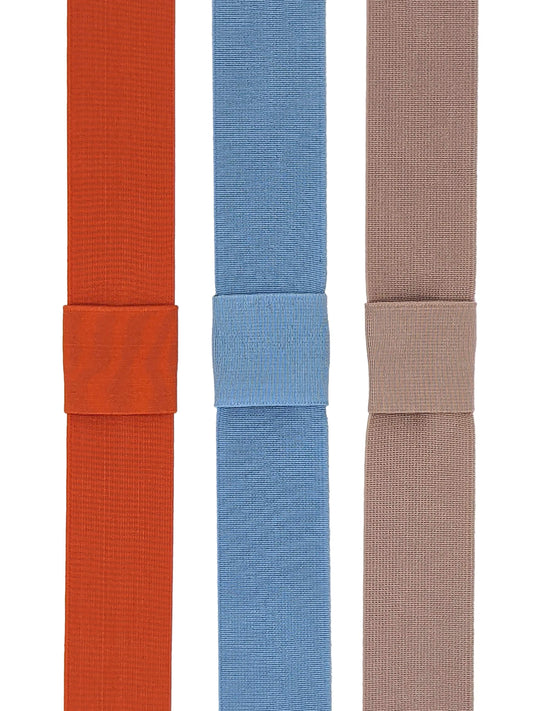 Three elasticated hat bands in orange, sky blue, and oyster colors, displayed side by side.