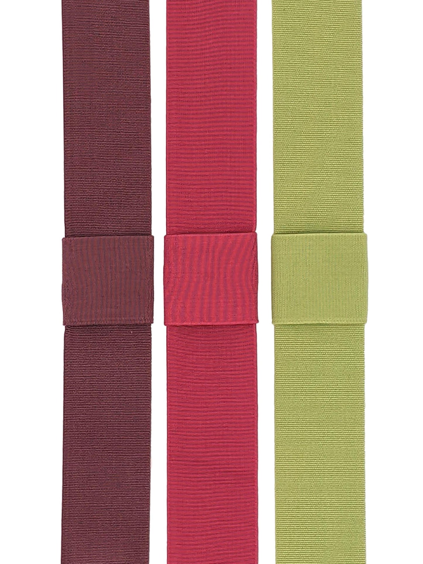 Three interchangeable elastic hat bands in mauve, magenta pink, and pistachio green colors, displayed side by side.